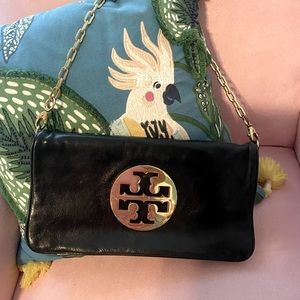 What a steal! Reva black and gold Tory magnetic closure purse. One of originals